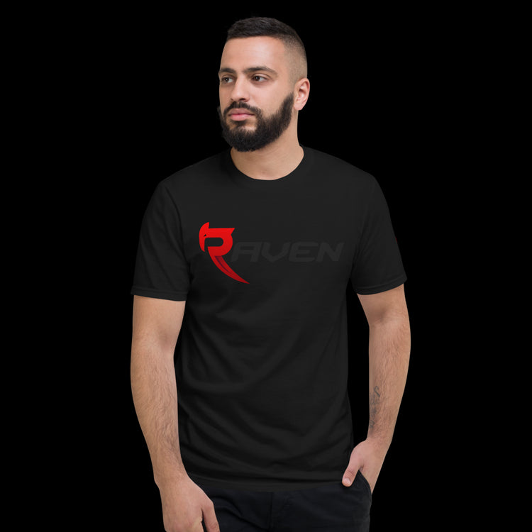 A black cotton t-shirt with red RAVEN Moto signature logo, worn by a young middle eastern male.